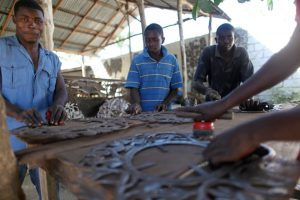 Metal artisans for Heart of Haiti Heart of Haiti Trade not aid for Macy's